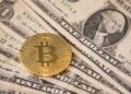 Bitcoin tumbles to less than $100,000 as a strong U.S. dollar hits crypto