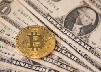 Bitcoin tumbles to less than $100,000 as a strong U.S. dollar hits crypto