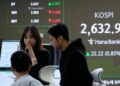 Stock market today: Asian shares are mixed after Wall Street falls back ahead of Fed rate decision