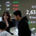 Stock market today: Asian shares are mixed after Wall Street falls back ahead of Fed rate decision