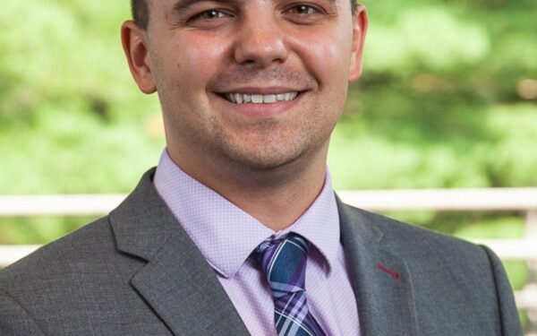 Alex C. Carrozzi Displays Excellence in Financial Services