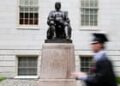Trump signs proclamation to restrict foreign student visas at Harvard