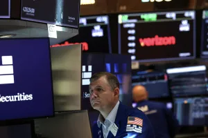 Stock market closes out chaotic quarter on a high note as S&P 500 notches another new record