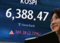 KOSPI sets record peak amid hopes of peace talks, tech rally